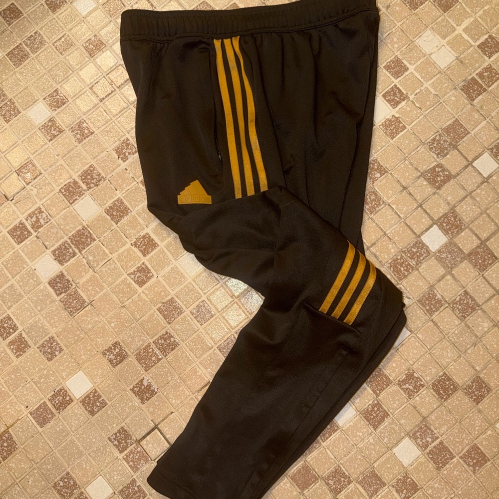 adidas Black Joggers with Gold Stripe Details
